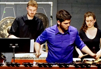 NYU percussion players performing