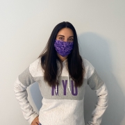 Michelle wearing a purple mask and an NYU sweatshirt