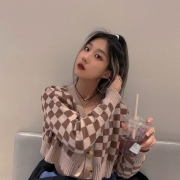 Ada Yang holding an iced coffee