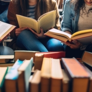 Kids reading books in a library.