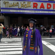 Portrait of Brianna Grand during graduation outside Raio City Music Hall.