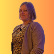 image captures headshot PRE Researcher Sara McAlister standing in front of a yellow colored background