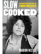 The cover of Marion Nestle's book, Slow Cooked, featuring a black-and-white photo of Nestle.