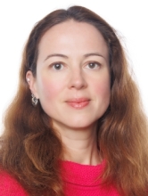 Evgeniya Kondrashina headshot wearing red sweater
