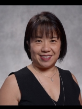 Asian female with short black hair