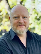 Headshot of Prof Sam Howard Spink