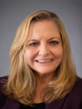 professional image of woman smiling into camera