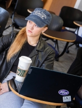 Eve Skatrud sits in class