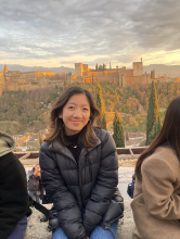 Photos of Laura with city in the background