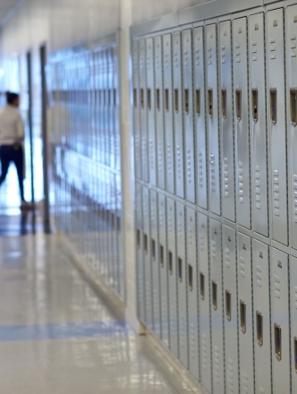 A row of lockers in a high school hallway