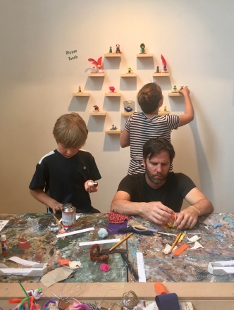 Kids with adult making art