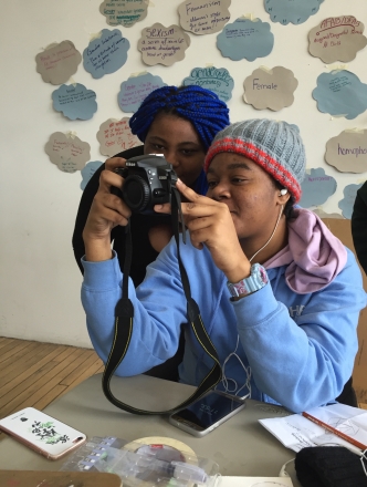 Students in class with camera