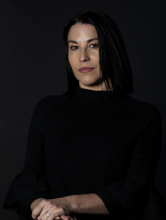 Portrait of Arlene Davilla in all black