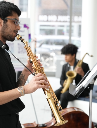 NYU student from Brass Studies performing at paulson center