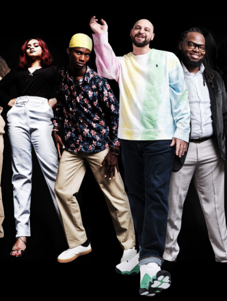Six dancers representing hip hop posing for camera