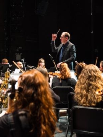 Ted Sperling conducting NYU Broadway orchestra