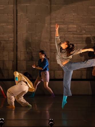 NYU dance ed performing on stage in casual clothes