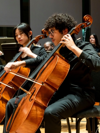Cello and violins in concert