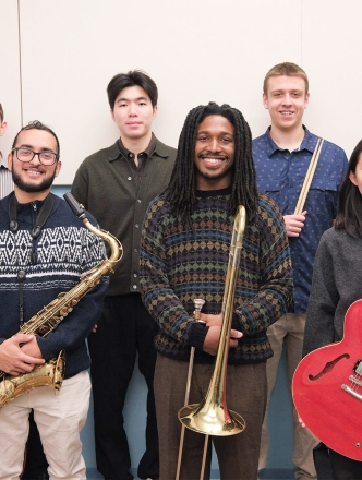 Students from Jazz program posing with instruments