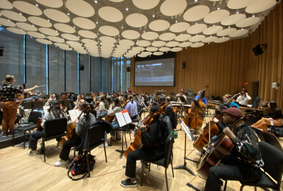 Orchestra performing screen scoring film